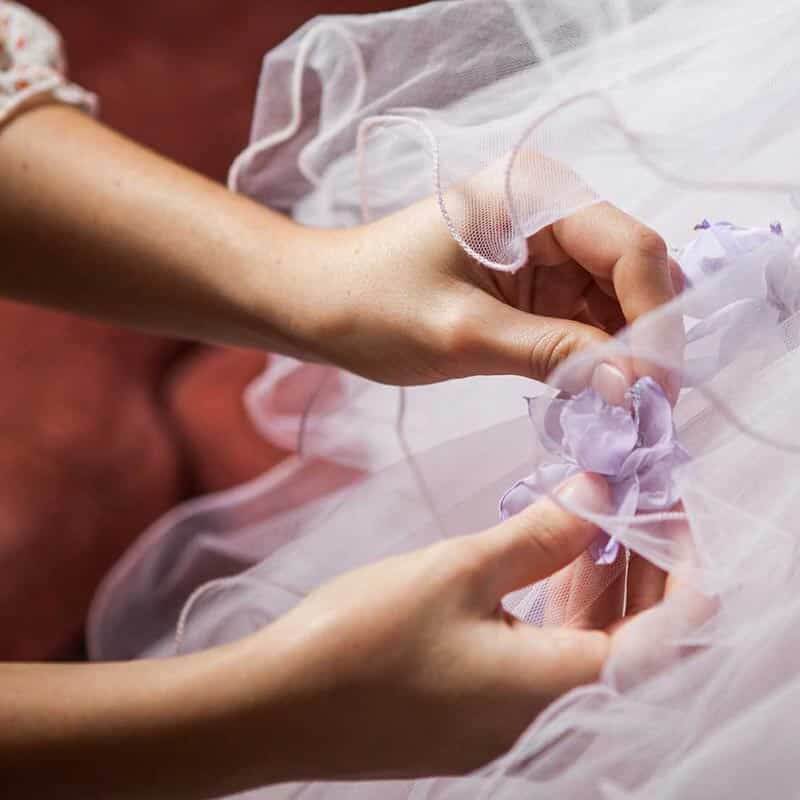 COURSES-featured-fashion-design-p2-sq Close up of hands making a dress after taking Professional Fashion Design and Dressmaking course