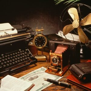 A variety of antique items being used for studing an antiques course