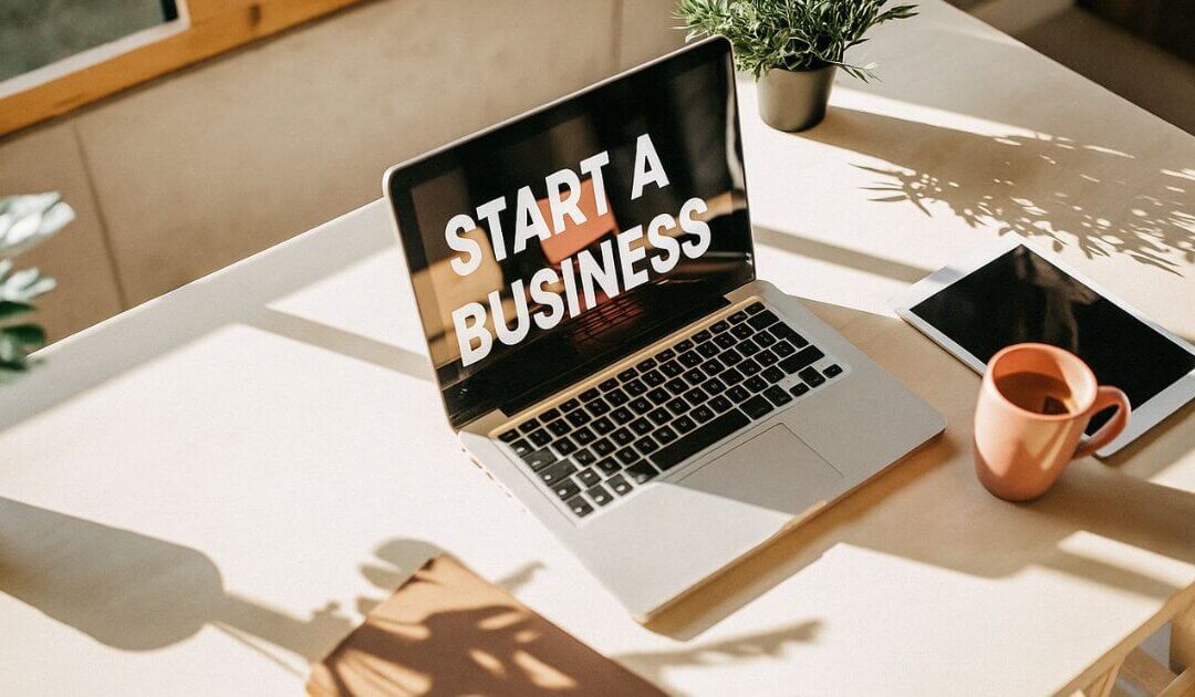 laptop screen showing words starting a business from home