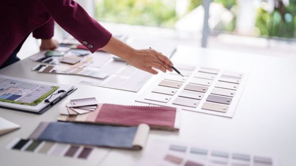 Interior designer selecting materials for a mood board